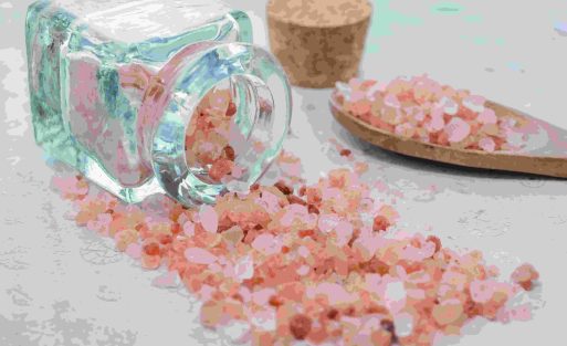 closeup-shot-jar-wooden-spoon-with-pink-sea-salt